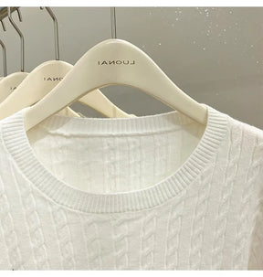 Maglione a Trecce