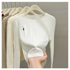 Maglione a Trecce